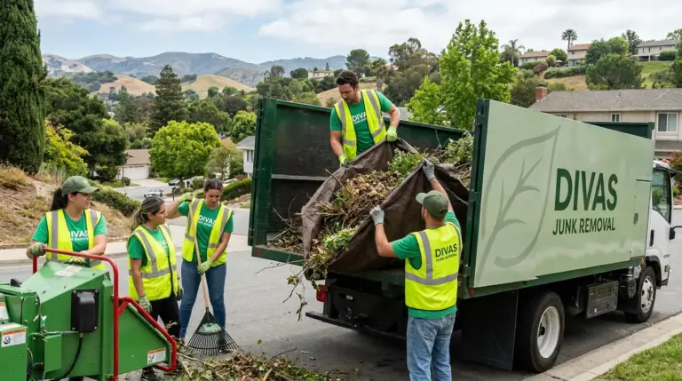 Green waste and yard debris being cleared from a residential area.